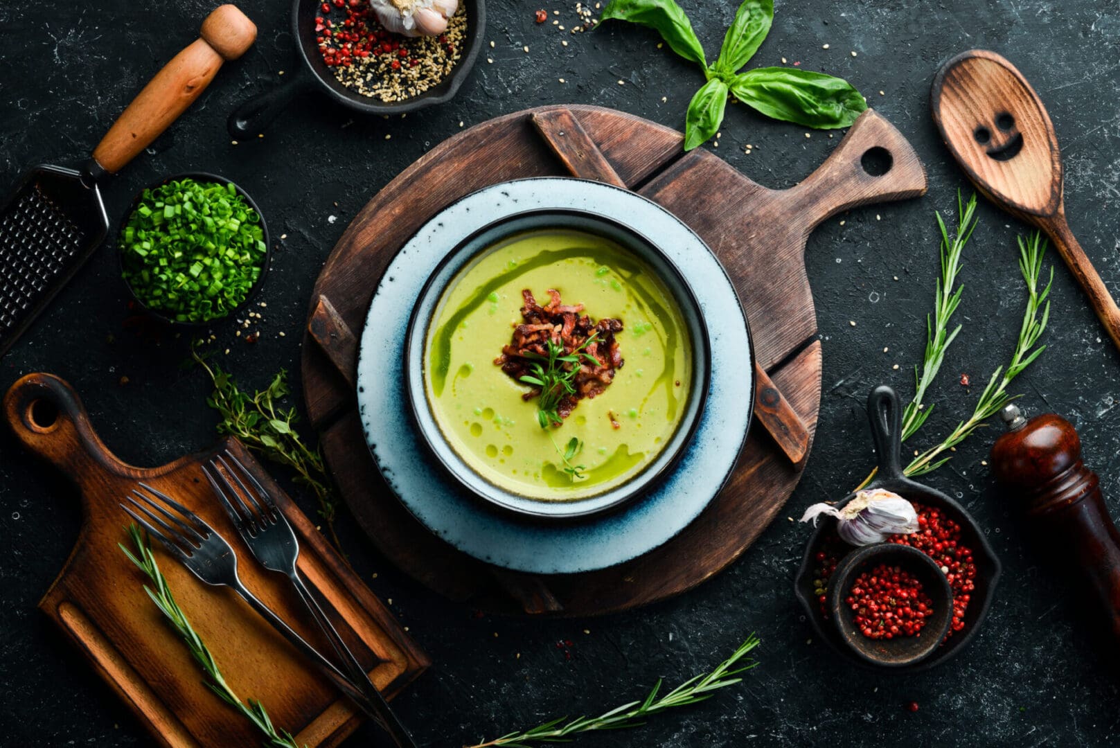 Green pea soup with bacon garnish.