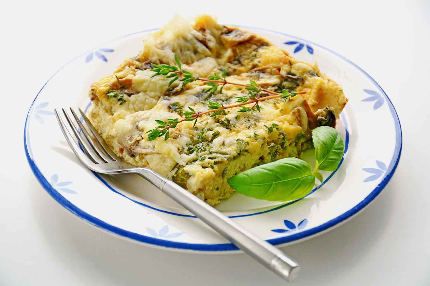 Mushroom and cheese frittata with herbs.