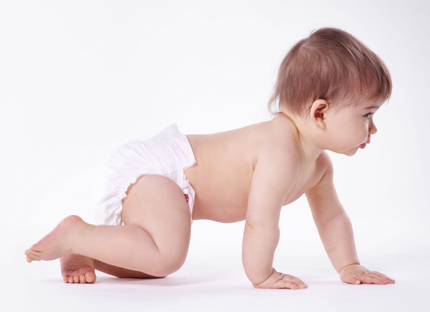 Baby crawling on white background.