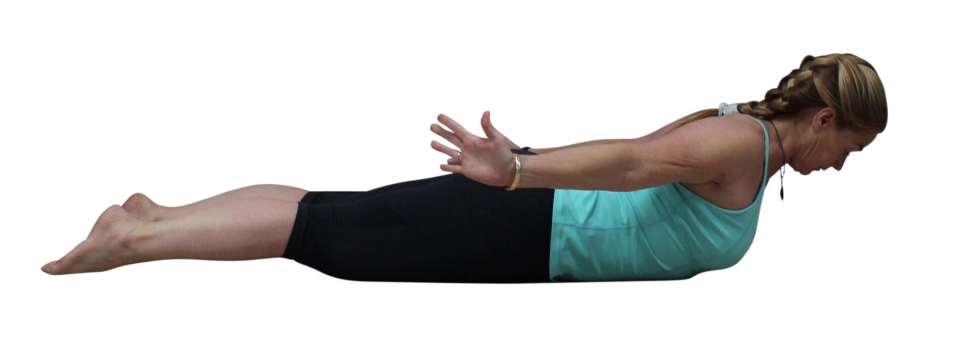 Woman in a yoga pose with arms extended.