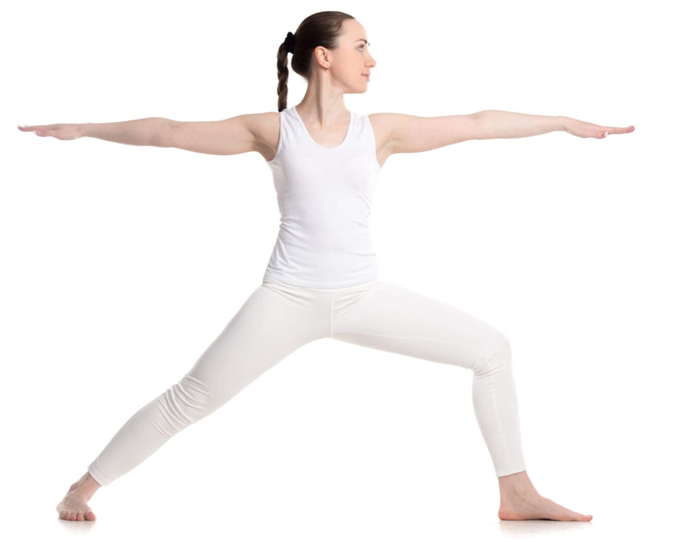 Woman in white doing a yoga pose.