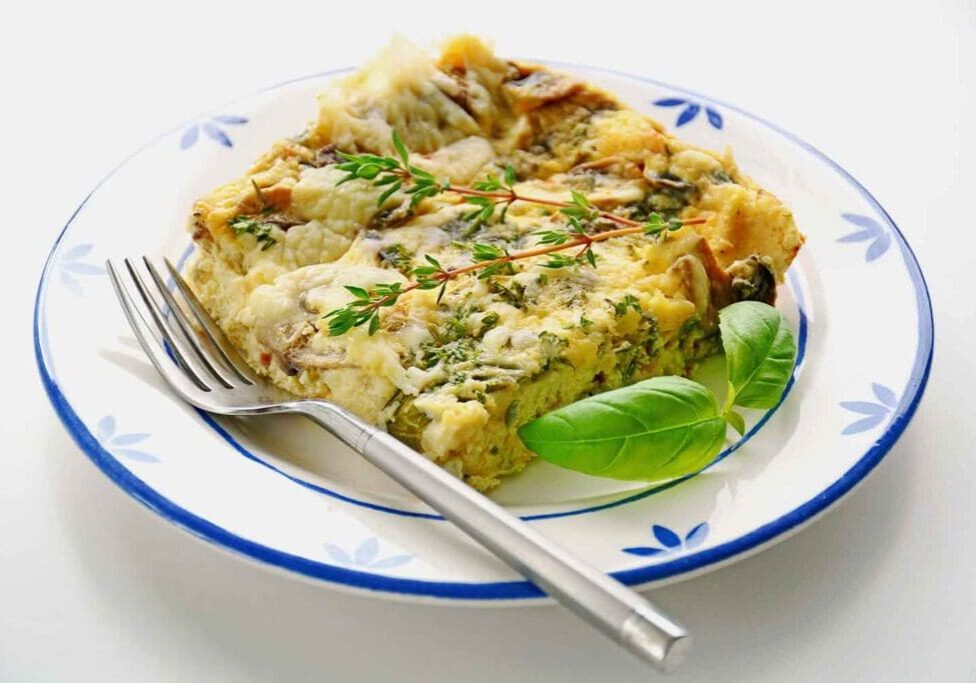 Mushroom and cheese frittata with herbs.