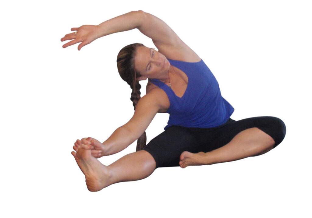 Woman in blue tank top doing yoga.