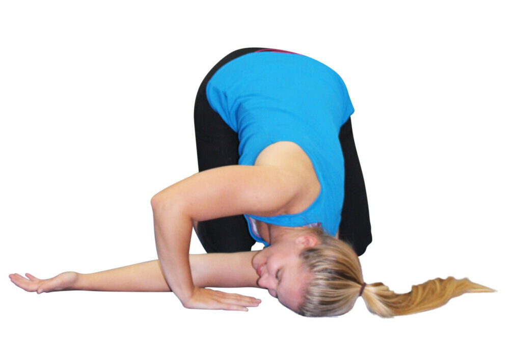 Woman in blue tank top doing a yoga pose.